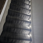 stair lights installed along one side of a staircase